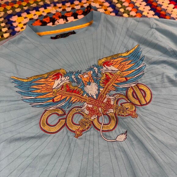Vintage COOGI T-Shirt โ Blue โ Embroidered Eagle Sword Graphic โ Size Large - Picture 2 of 8